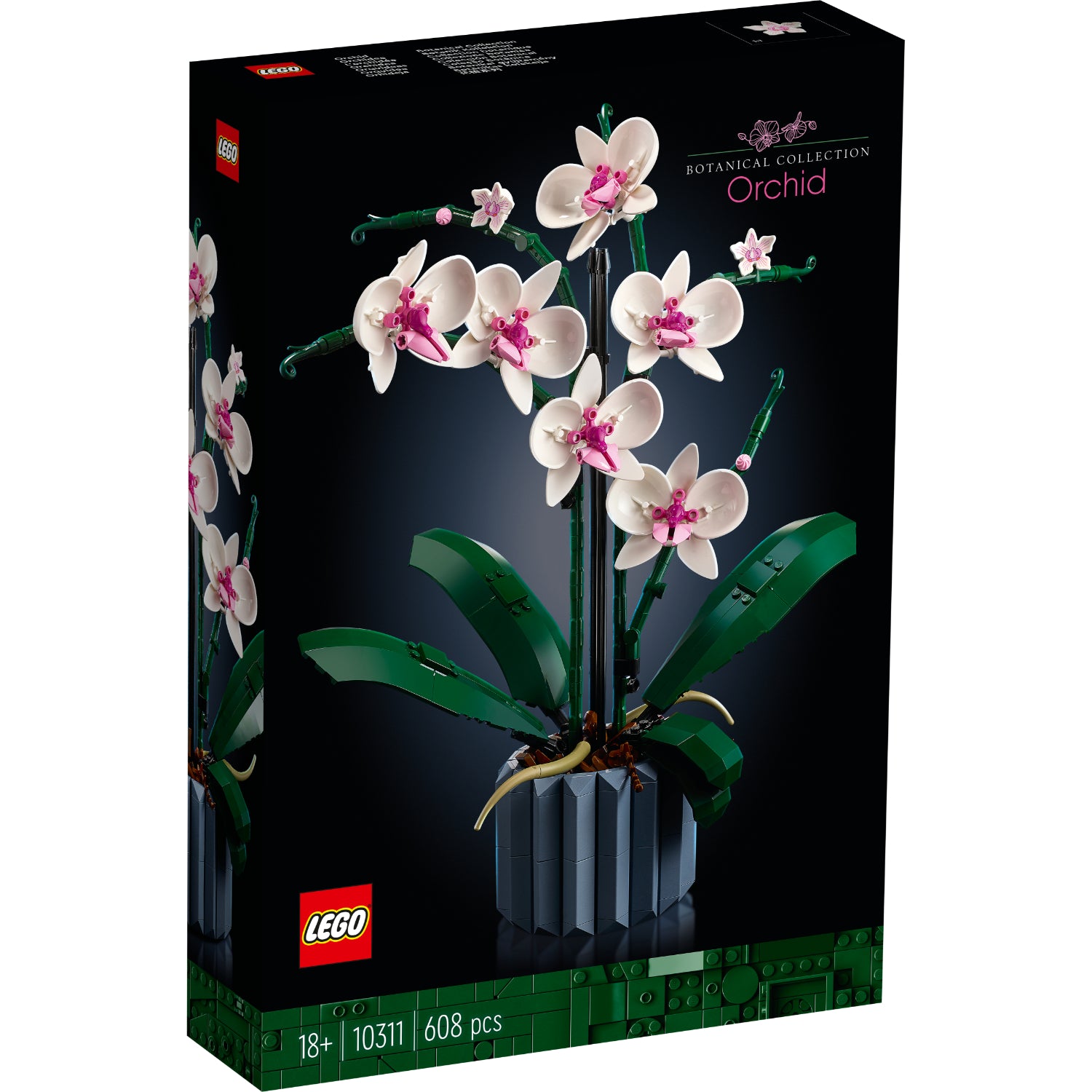 Modelo LEGO Orchid 10311 con flores blancas y rosas en jarrón azul decorativo